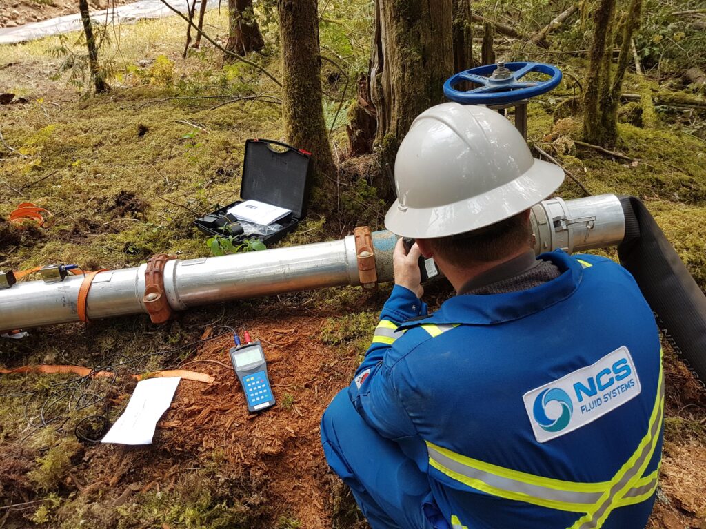 NCS Fluid Handling Systems field technician at work on water treatment project.