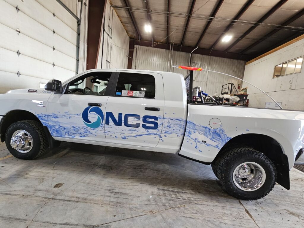 NCS white truck with new branding for service technicians.