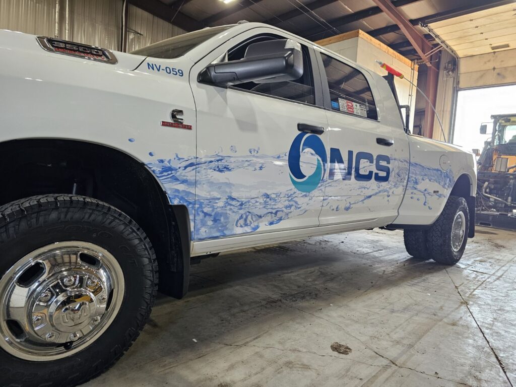 NCS white truck with new branding for service technicians.